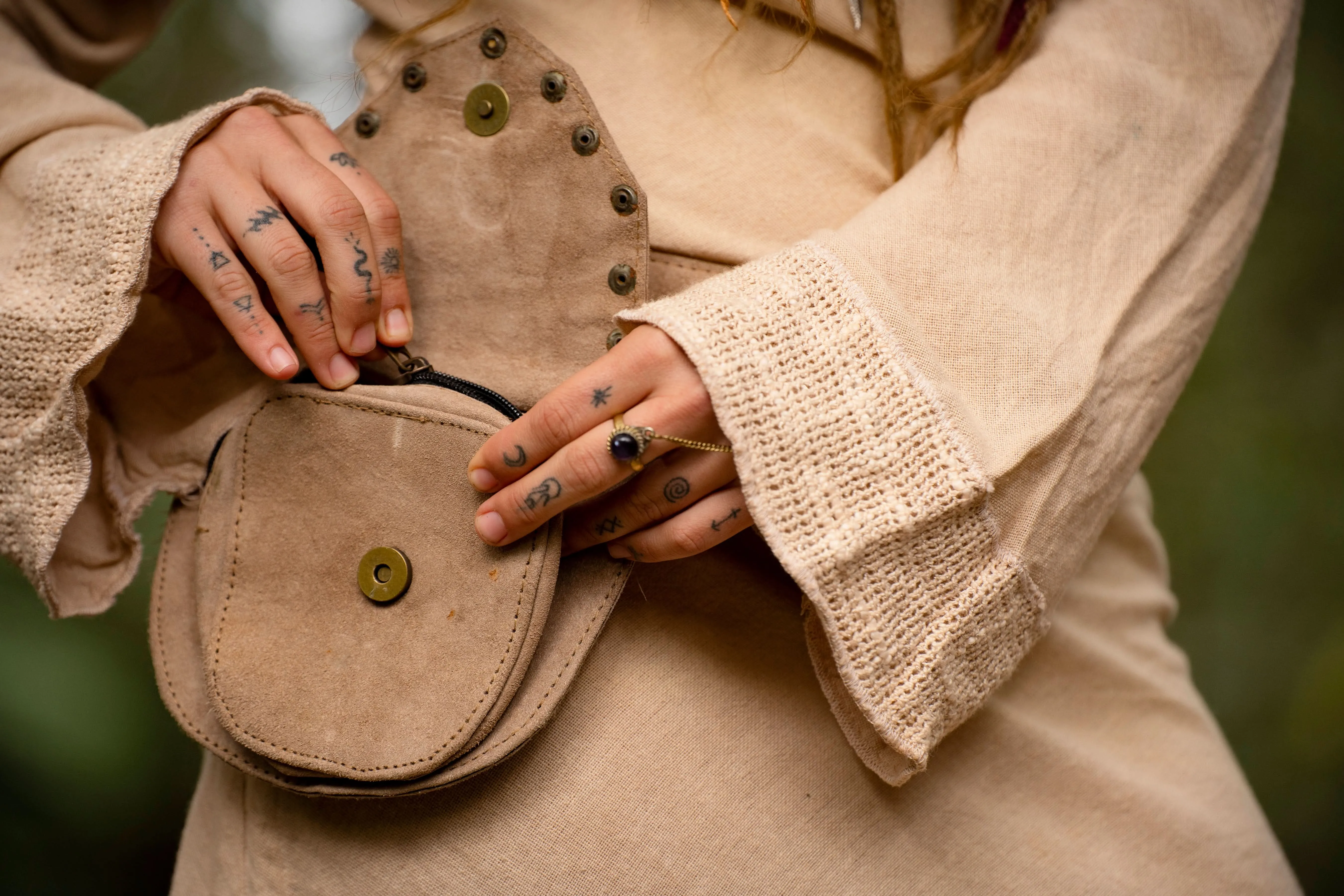 The Nile Recycled Leather Pocket Belt - Brown with Green Om Symbol